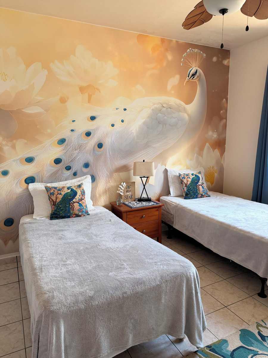 Twin bedroom with local artwork