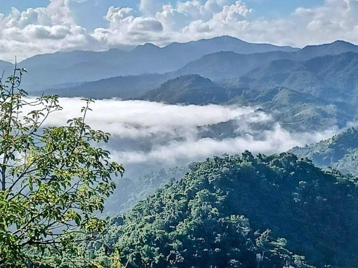 Morning sea of clouds filling the valleys below the retreat